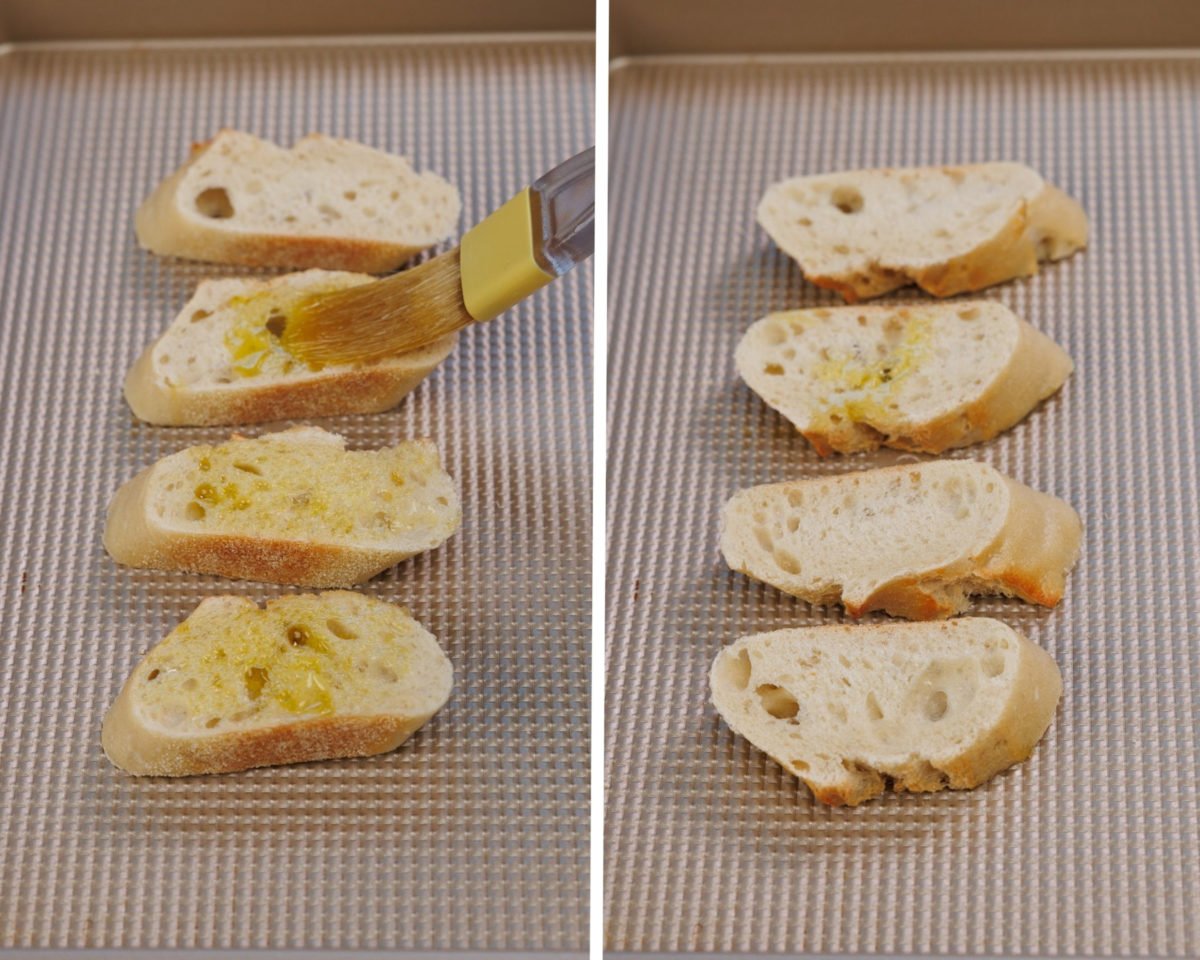 four slices of a baguette on a baking sheet.