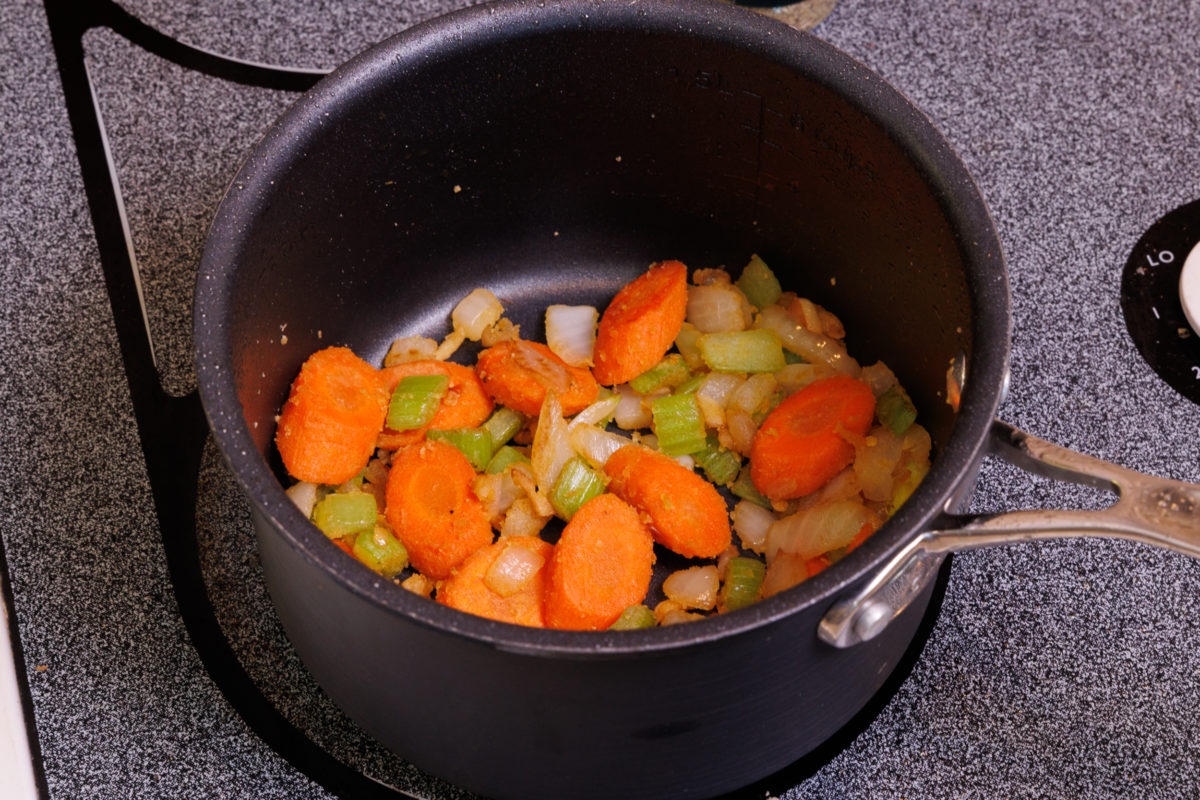 chopped celery, onions, carrots, and garlic in a small saucepan.