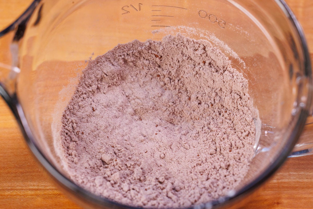 flour and cocoa powder in a mixing bowl.