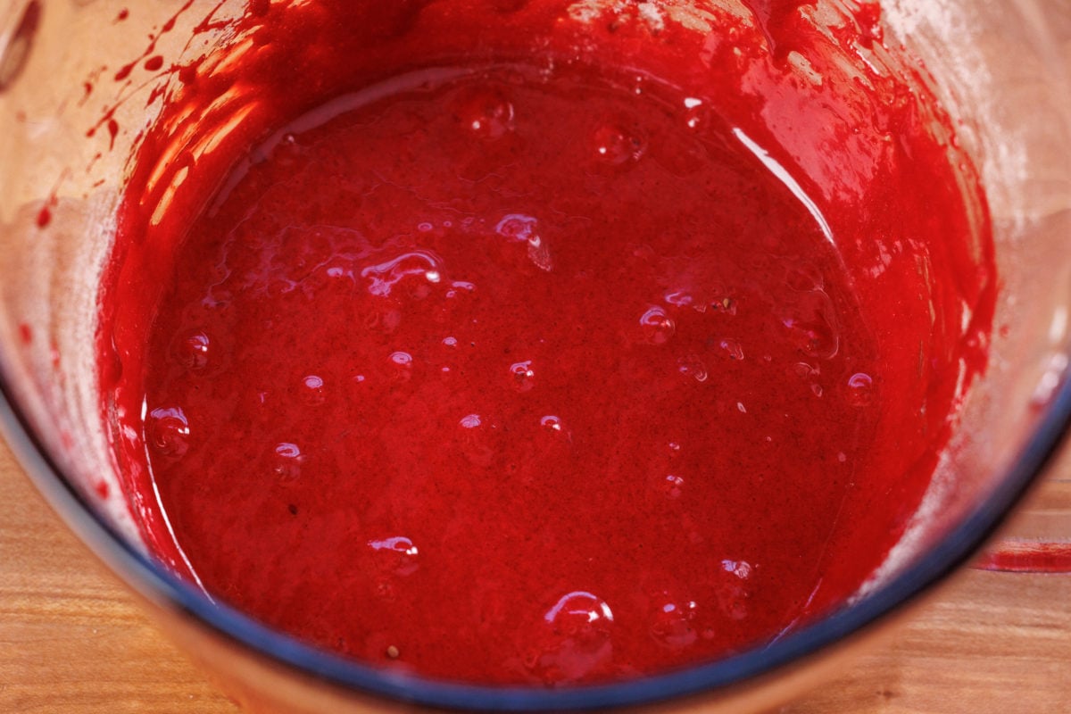 red velvet cake batter in a mixing bowl.