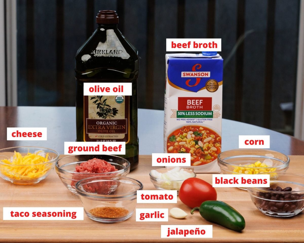ingredients needed to make a small batch of taco soup on a cutting board.