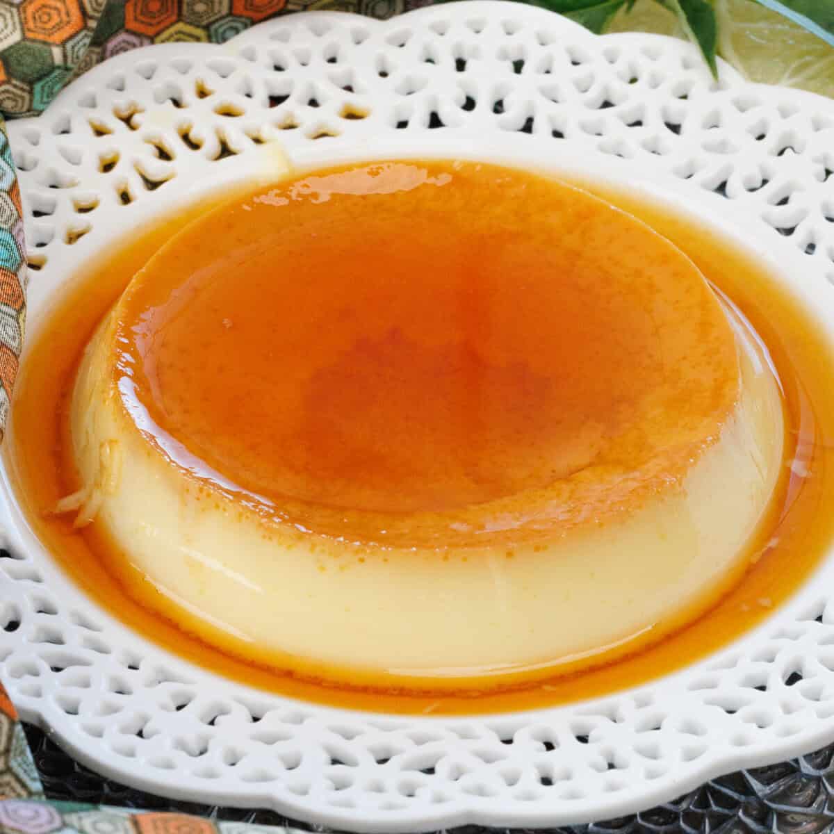 a single flan on a white plate.