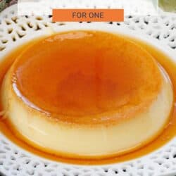 a single flan on a white plate surrounded by caramel.