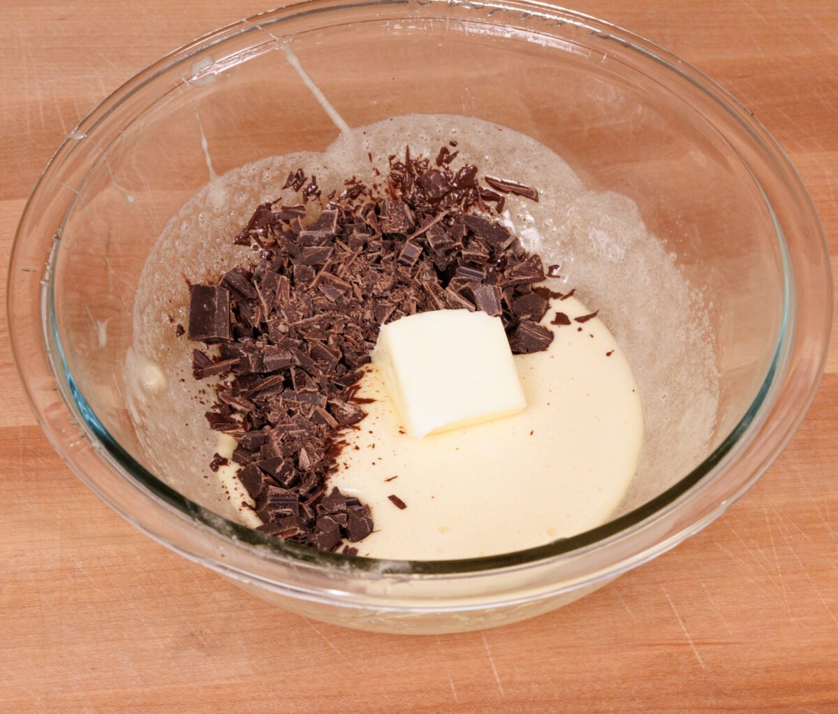 chopped chocolate and butter in a mixing bowl