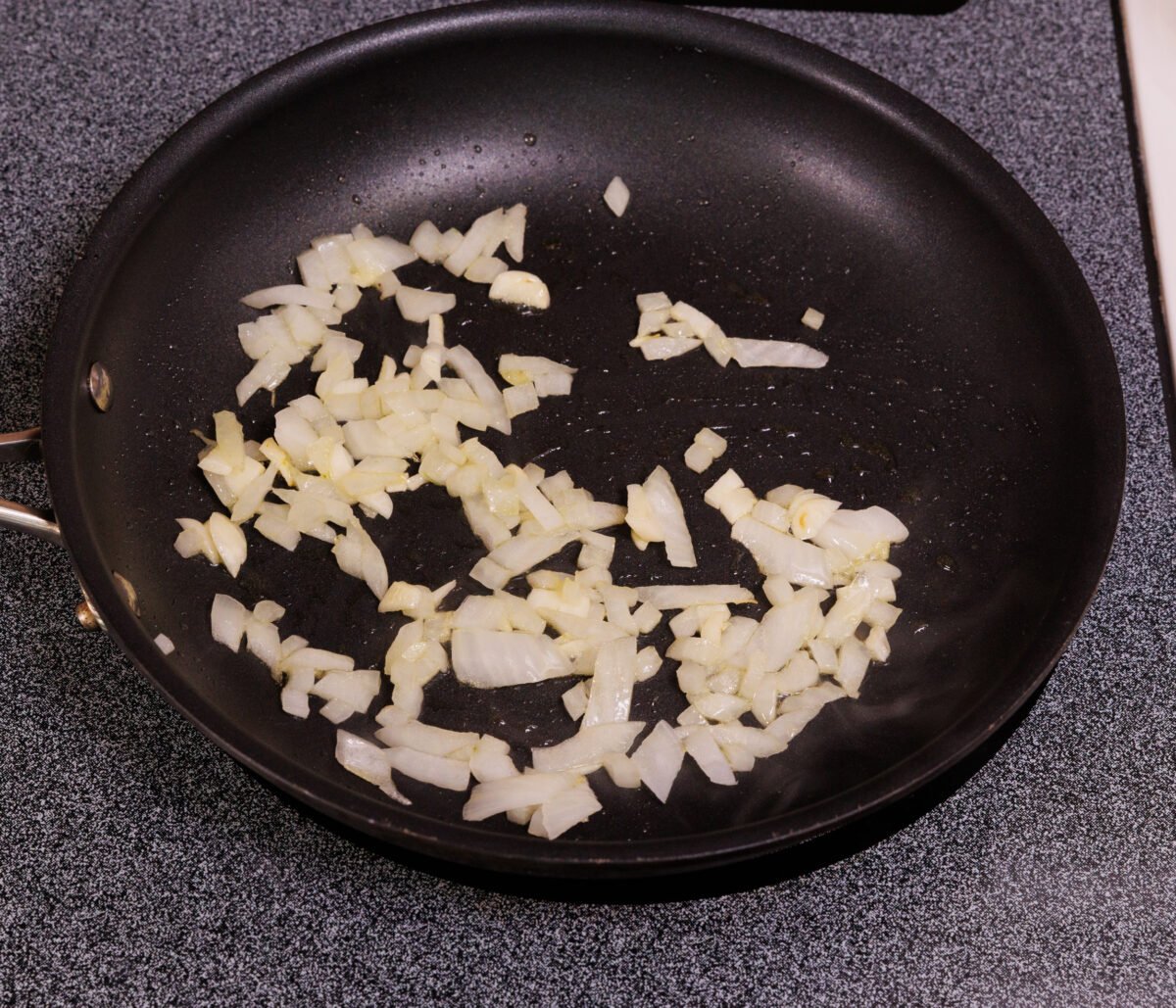 onions and garlic in a small black skillet.