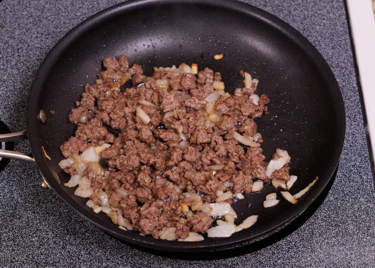 cooked ground beef in a skillet.