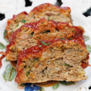 slices of turkey meatloaf on a white plate