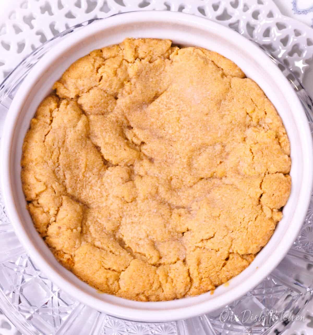 a deep dish peanut butter cookie in a ramekin.