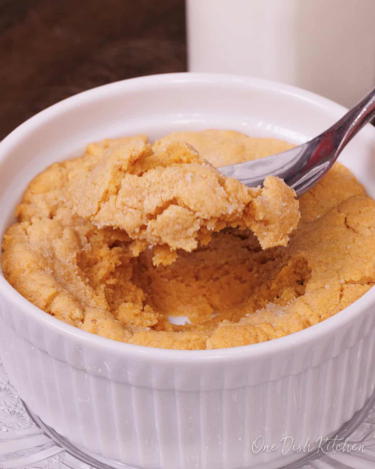 a single serve deep dish peanut butter cookie for one person in a ramekin.