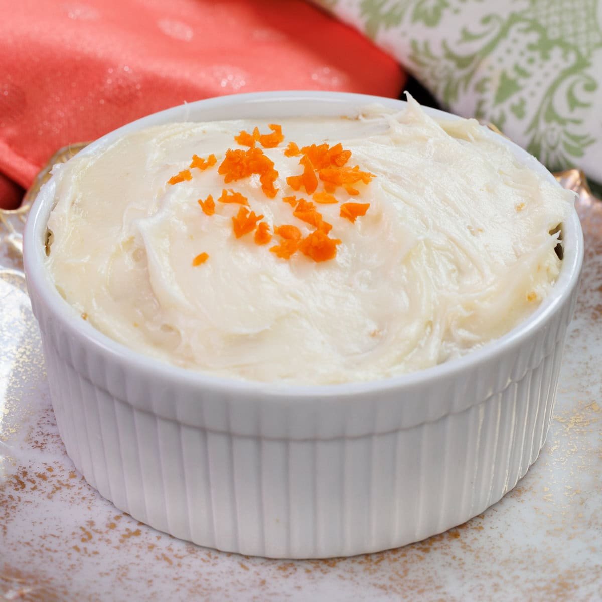 a small carrot cake in a ramekin.