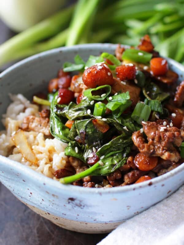 pork stir fry in a blue bowl.