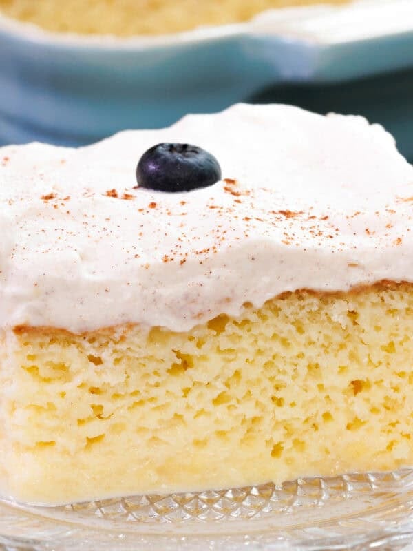 a slice of tres leches cake on a plate.