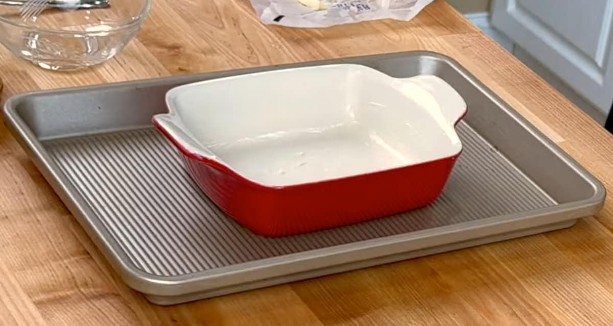 a small baking dish on a rimmed baking sheet
