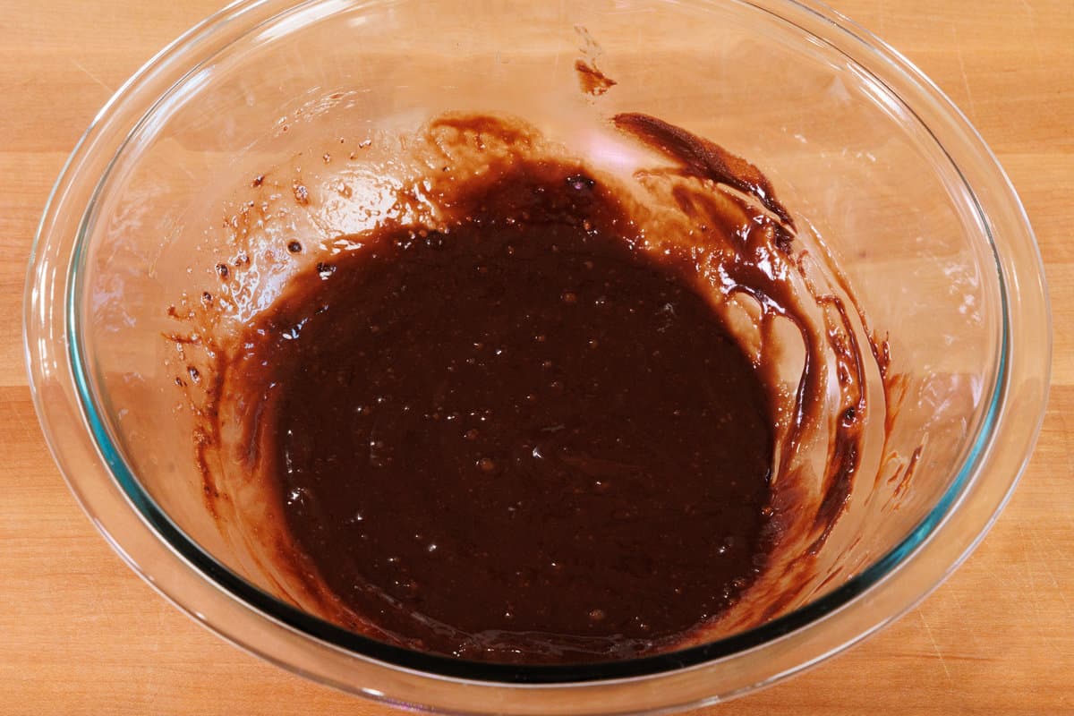 melted chocolate and egg in a mixing bowl.