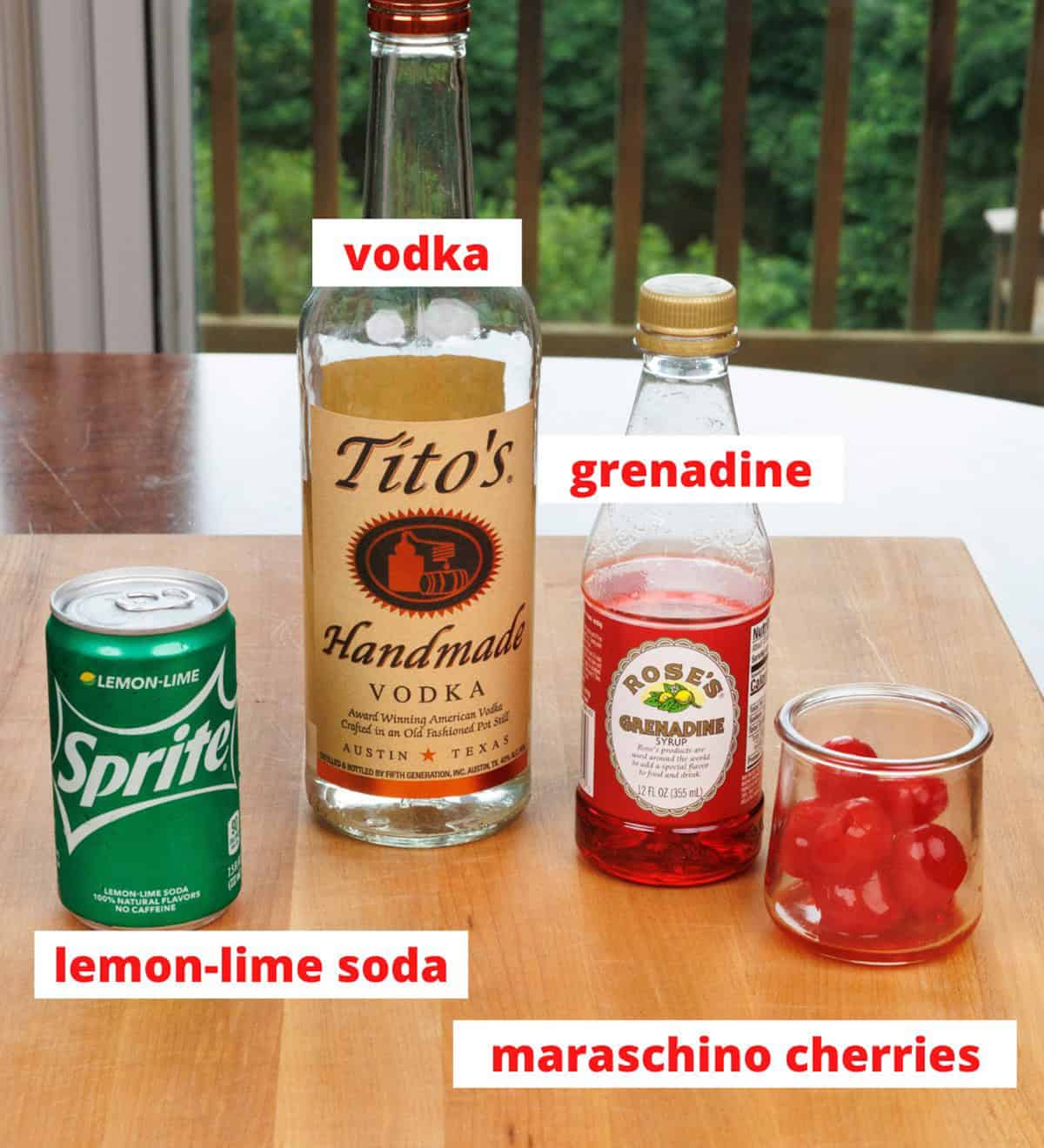 dirty shirley ingredients on a wooden cutting board in a kitchen.