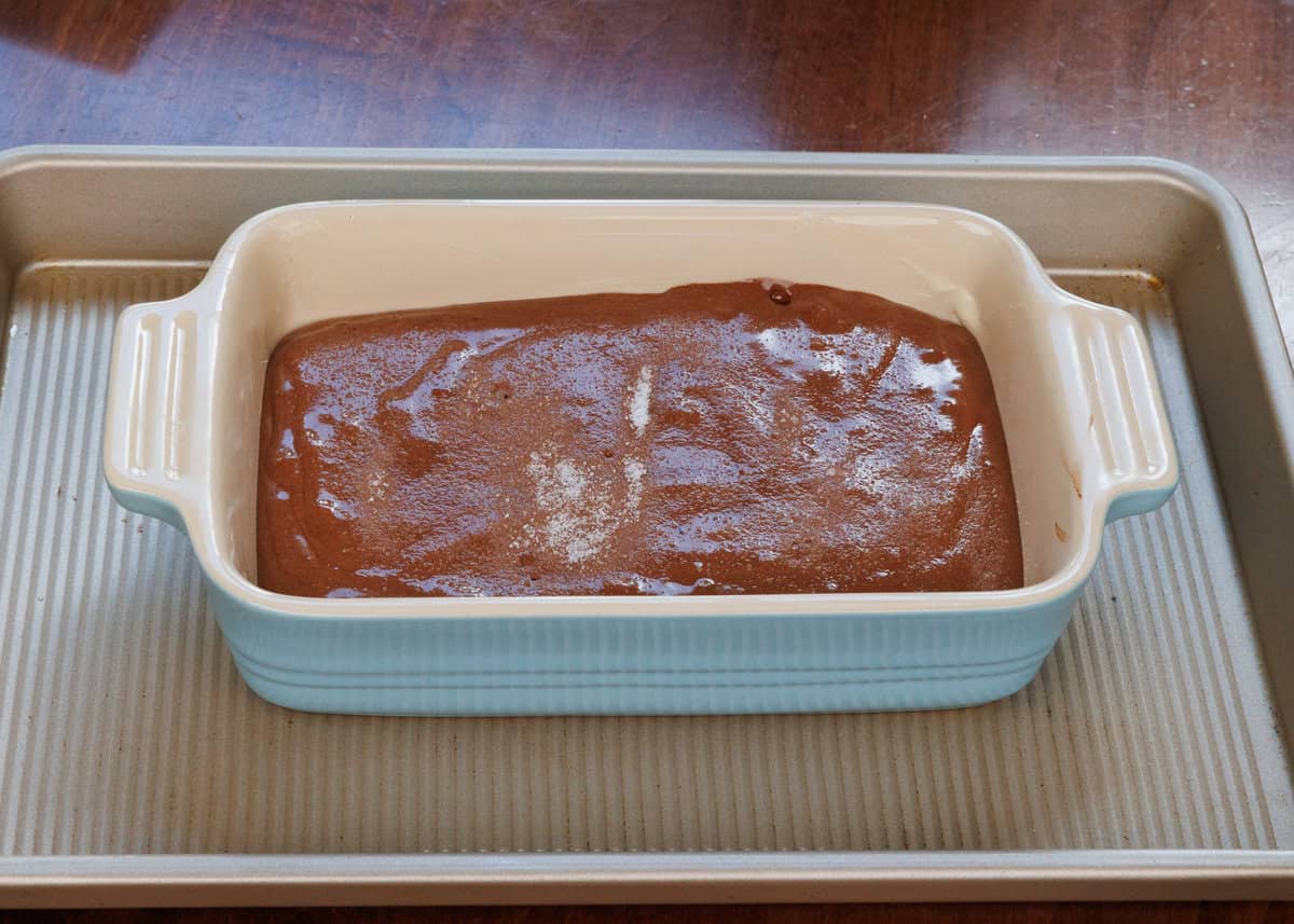 flourless chocolate cake batter in a small baking dish.