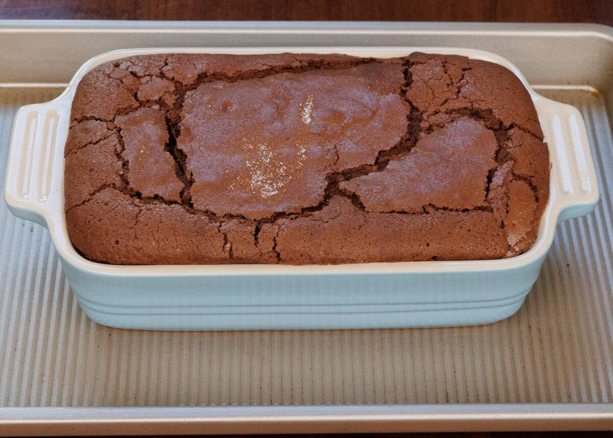 a mini fallen chocolate cake in a baking dish.