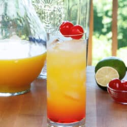 tequilia sunrise drink in a tall glass