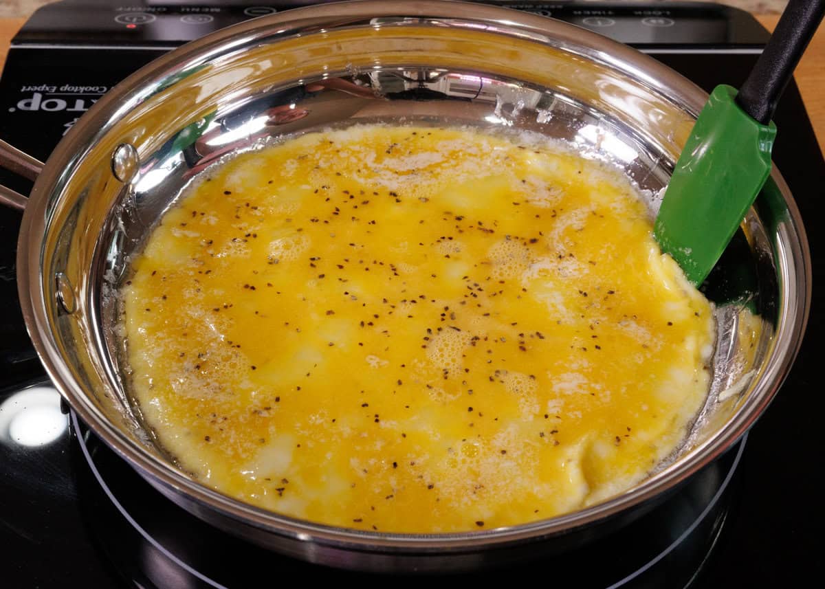 making eggs in a small skillet.