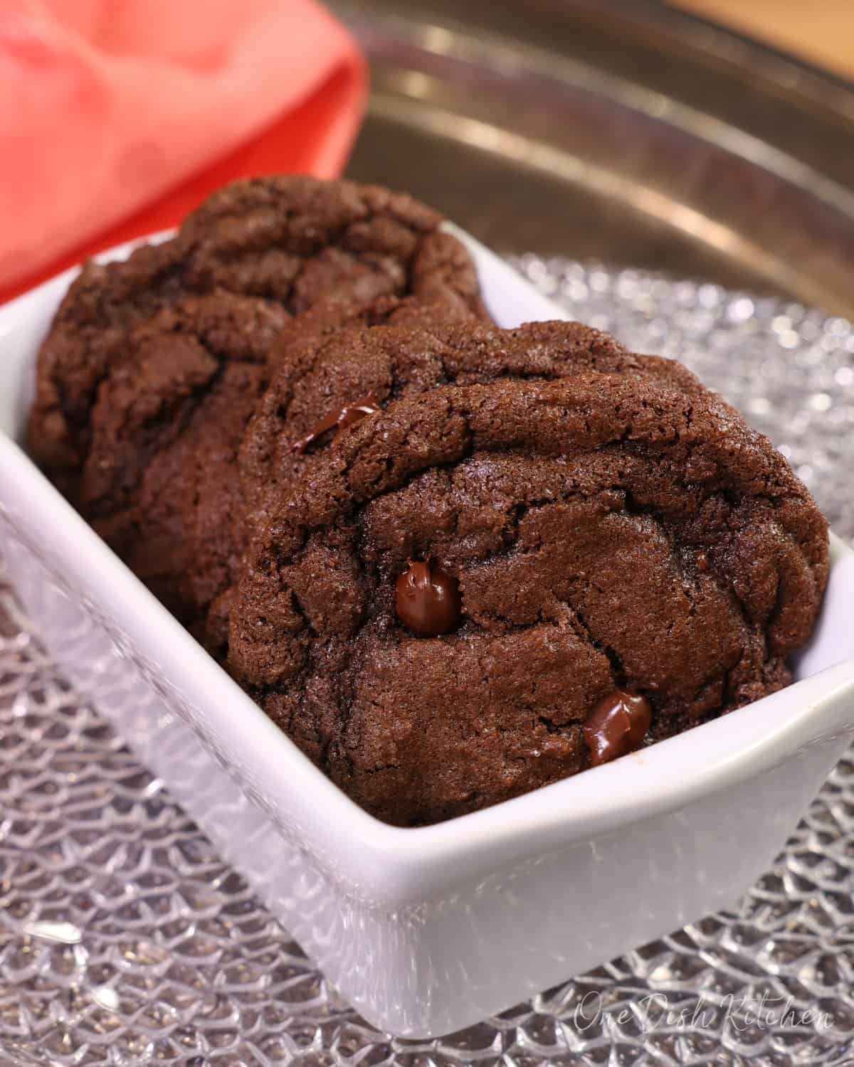 Plate of homemade small batch double chocolate chip cookies ready to serve.