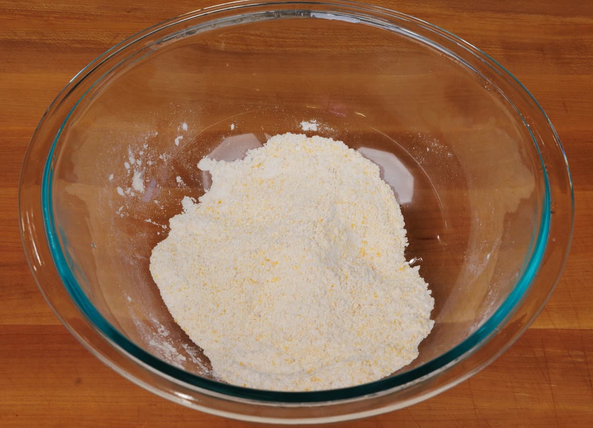 cornmeal, flour, baking powder, and salt in a mixing bowl