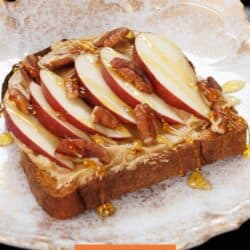 toast topped with peanut butter and sliced apples.