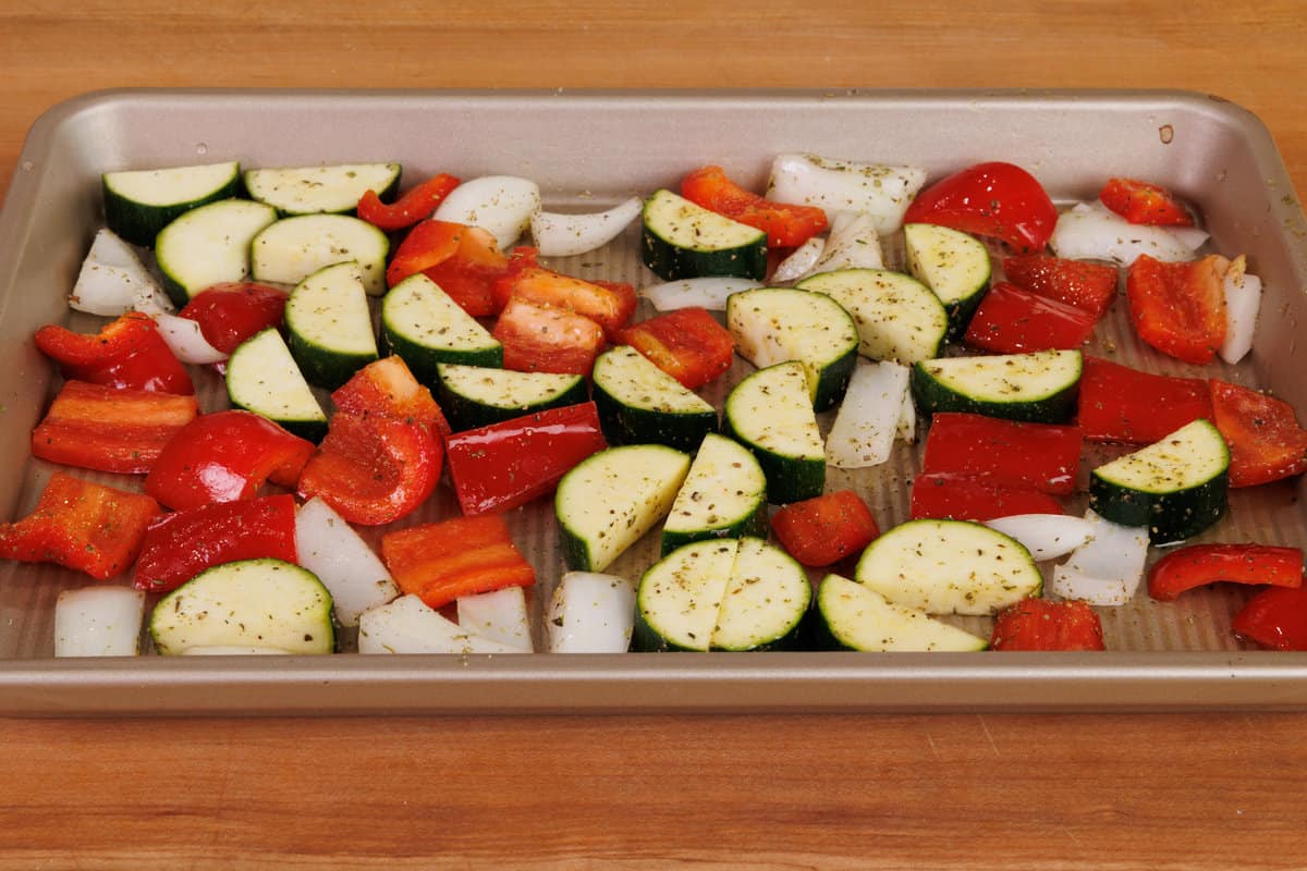 raw vegetables on a baking sheet