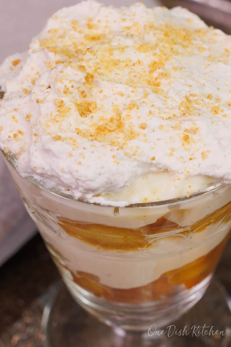 a single serve banana pudding topped with cookie crumbs.