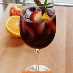 a glass of sangria with red wine.