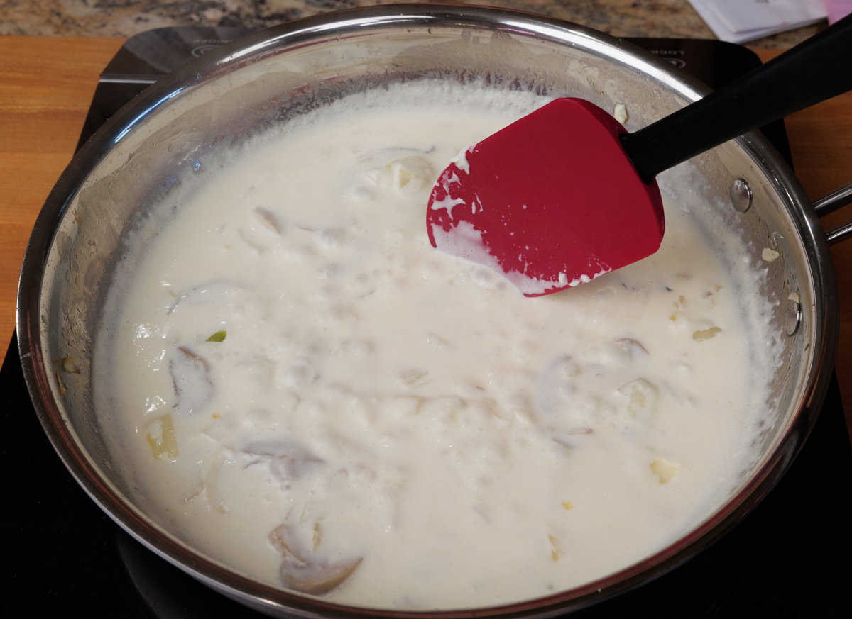 homemade cream of mushroom soup in a skillet