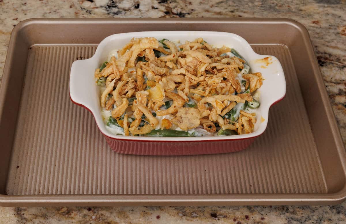 fried onions on top of a small green bean casserole