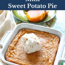 a small sweet potato pie in a white baking dish topped with whipped cream.
