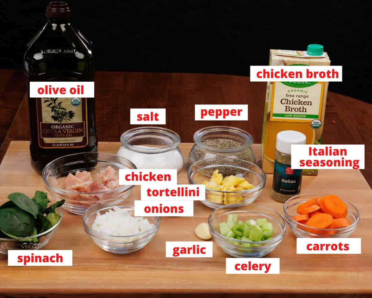 chicken tortellini soup ingredients on a kitchen counter