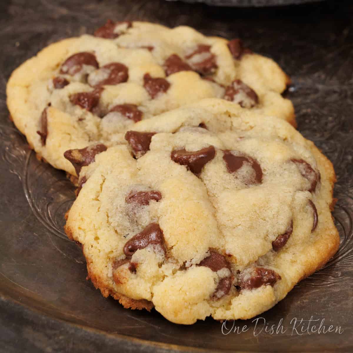chocolate chip cookies cooling on a tray.