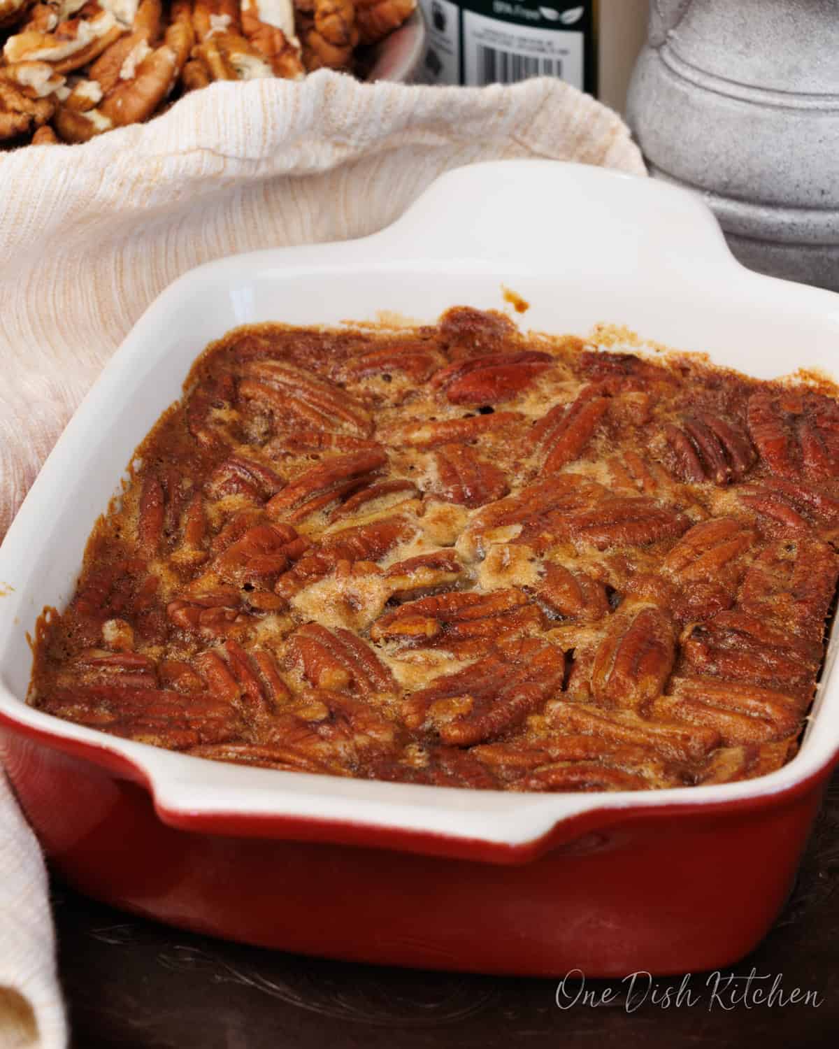 a mini pecan pie without corn syrup in a small baking dish.