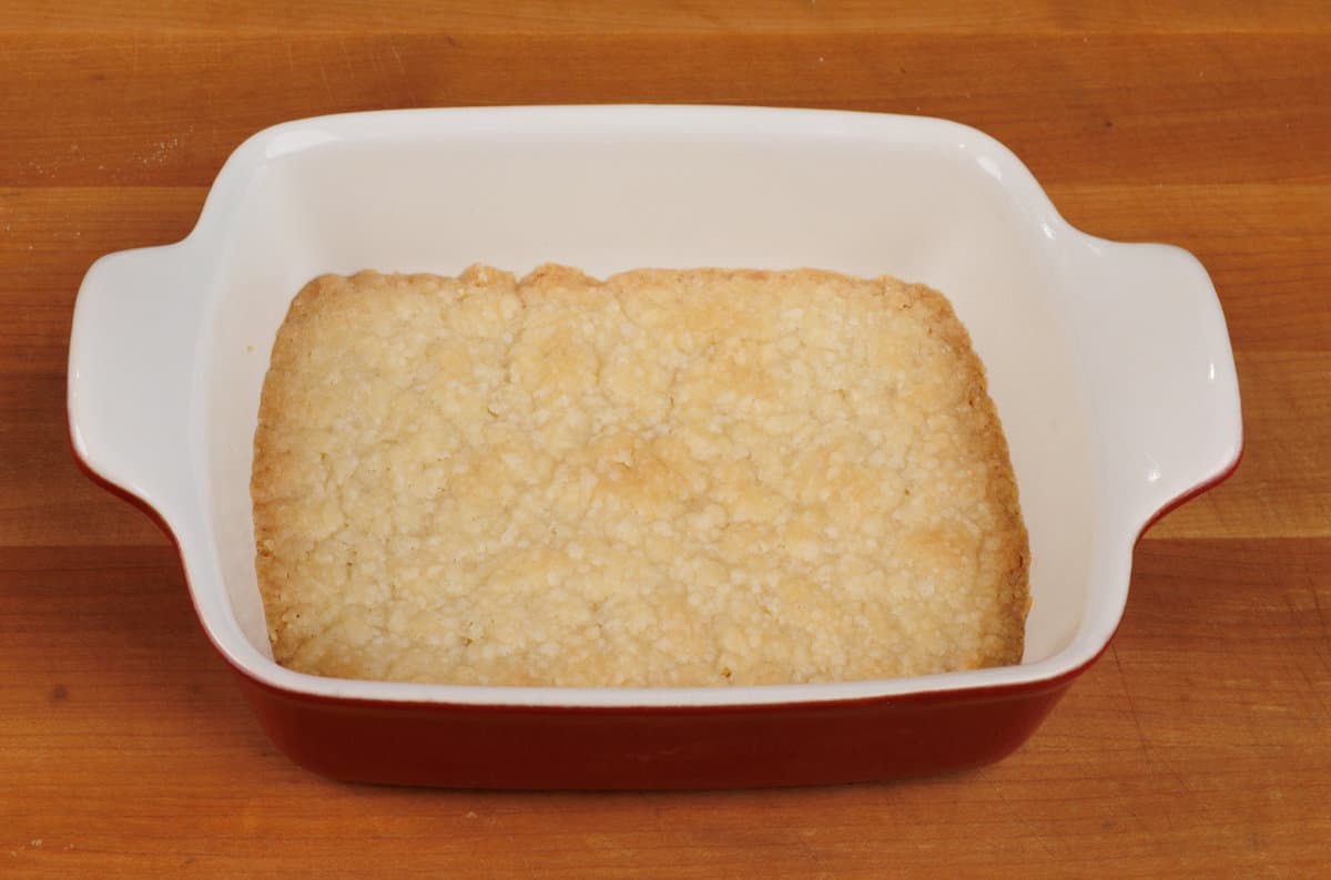 a crust in a small baking dish on a kitchen counter
