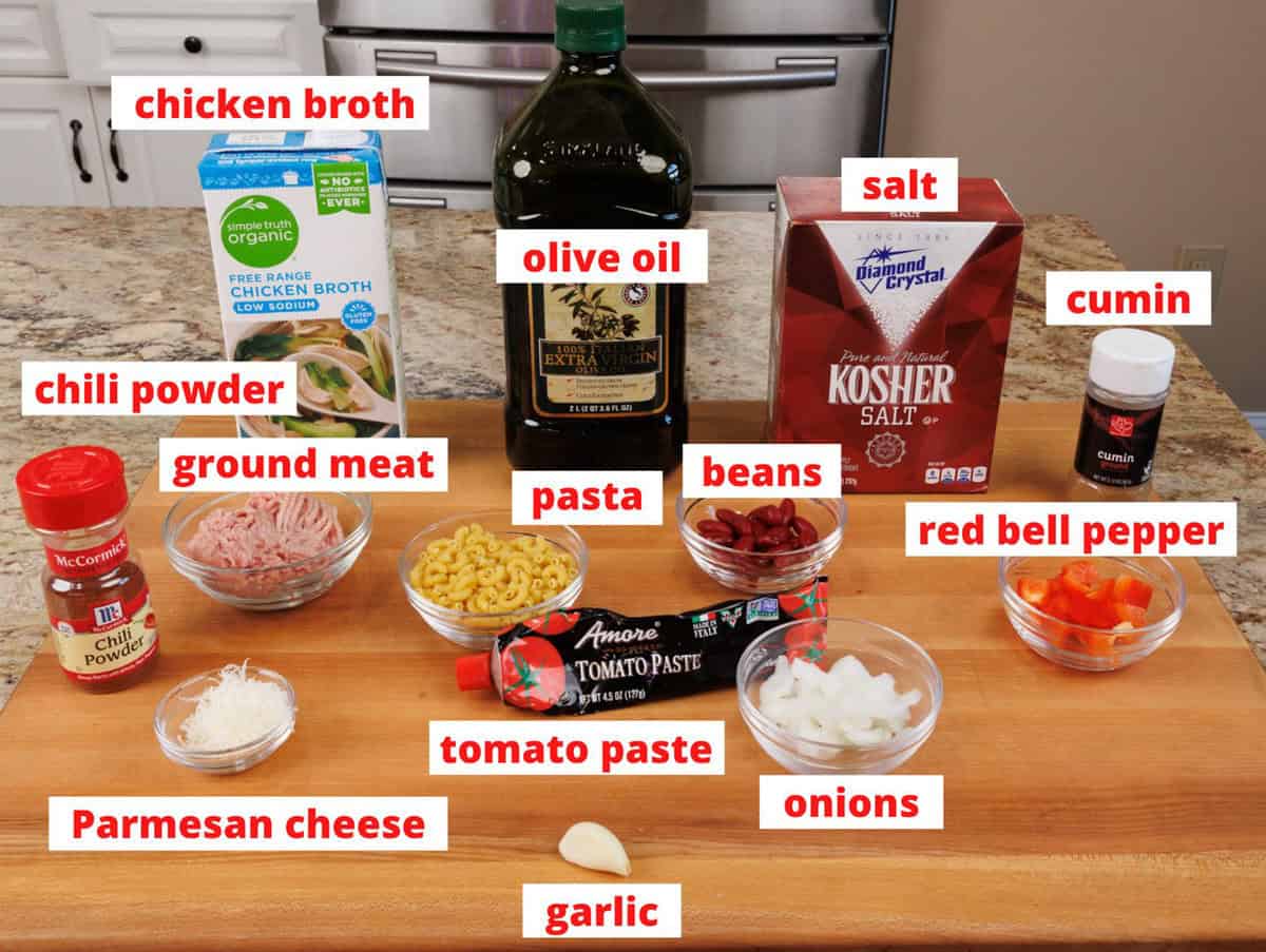 chili mac ingredients on a kitchen counter.
