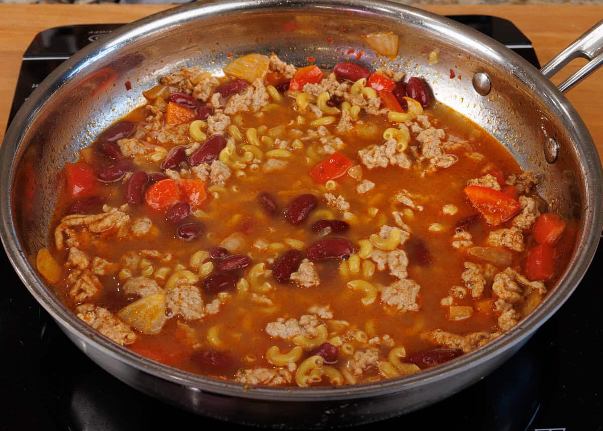 chili mac simmering on the stove.