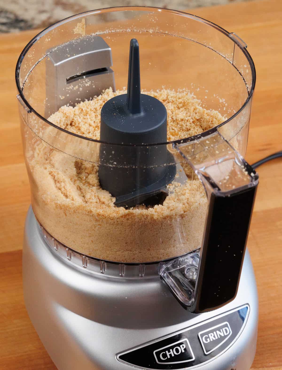 cookie crumbs in the base of a food processor