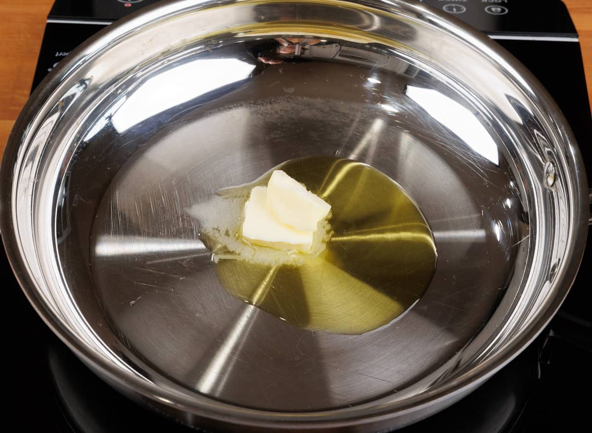 butter melting with olive oil in a small skillet