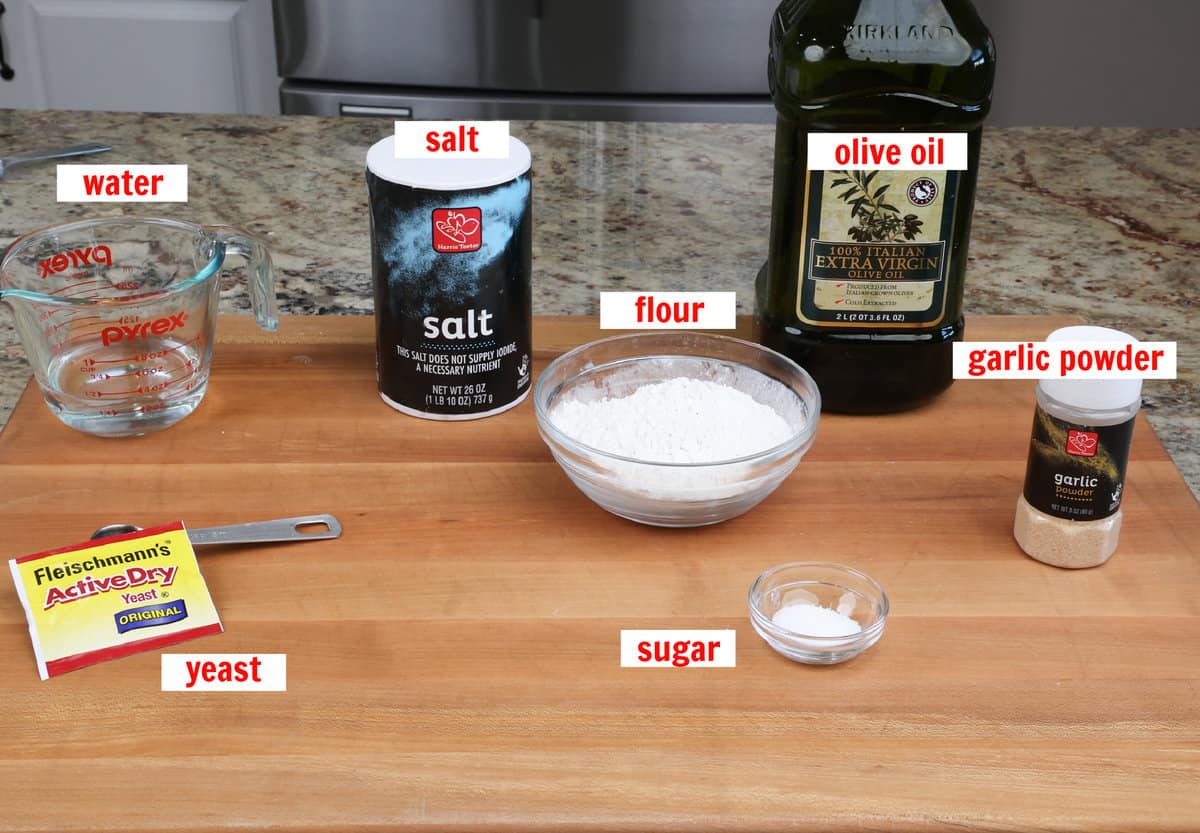 pizza dough ingredients on a kitchen counter.