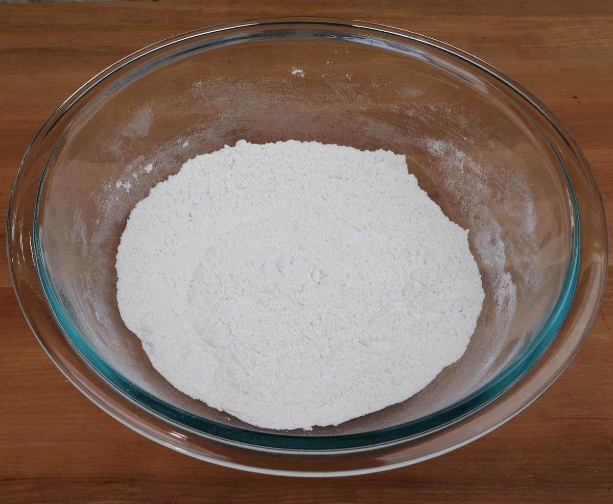 flour, sugar, baking powder, baking soda and salt in a mixing bowl