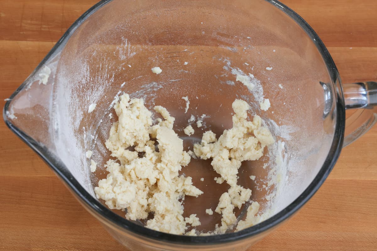 dough for a pie crust in a mixing bowl