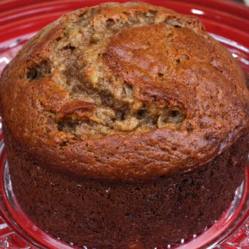 small banana nut bread on a red plate
