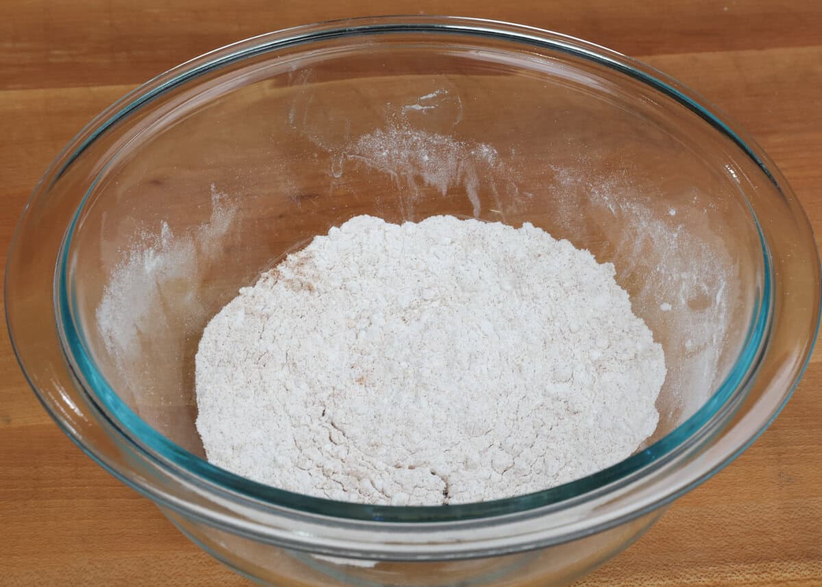 dry ingredients for banana nut bread in a mixing bowl.