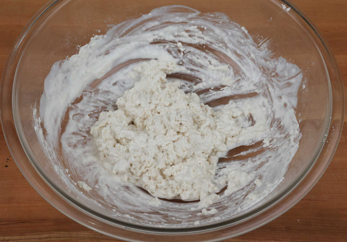 buttermilk biscuit dough in a mixing bowl