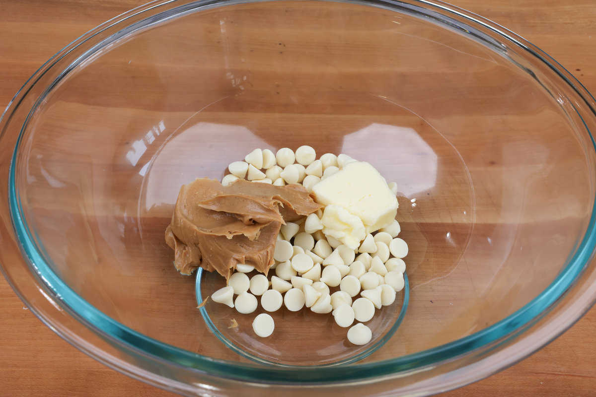 white chocolate chips, peanut butter, and butter in a large mixing bowl