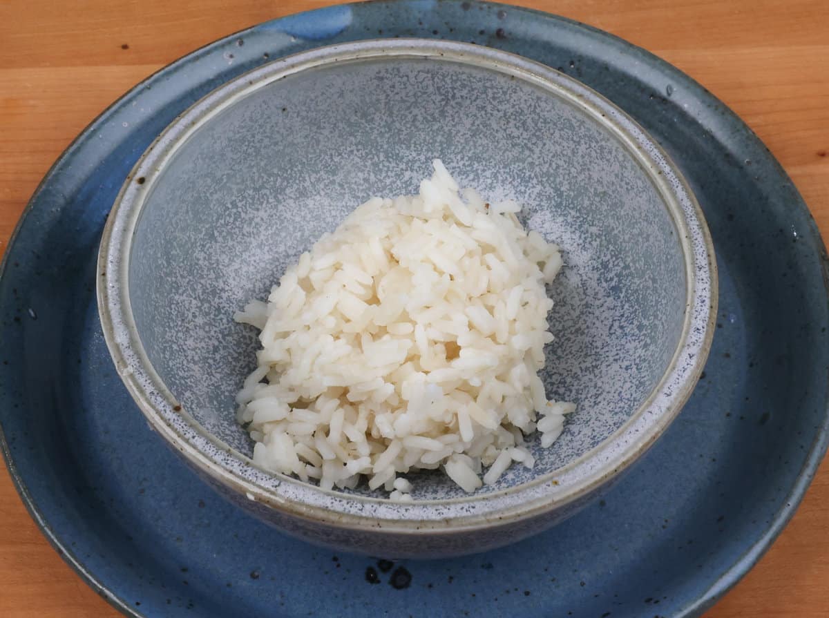 white rice in a blue bowl