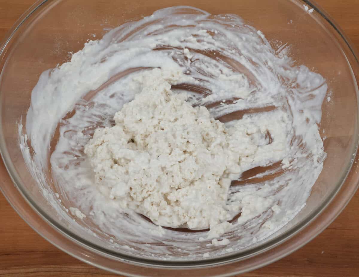 buttermilk biscuit dough in a mixing bowl.