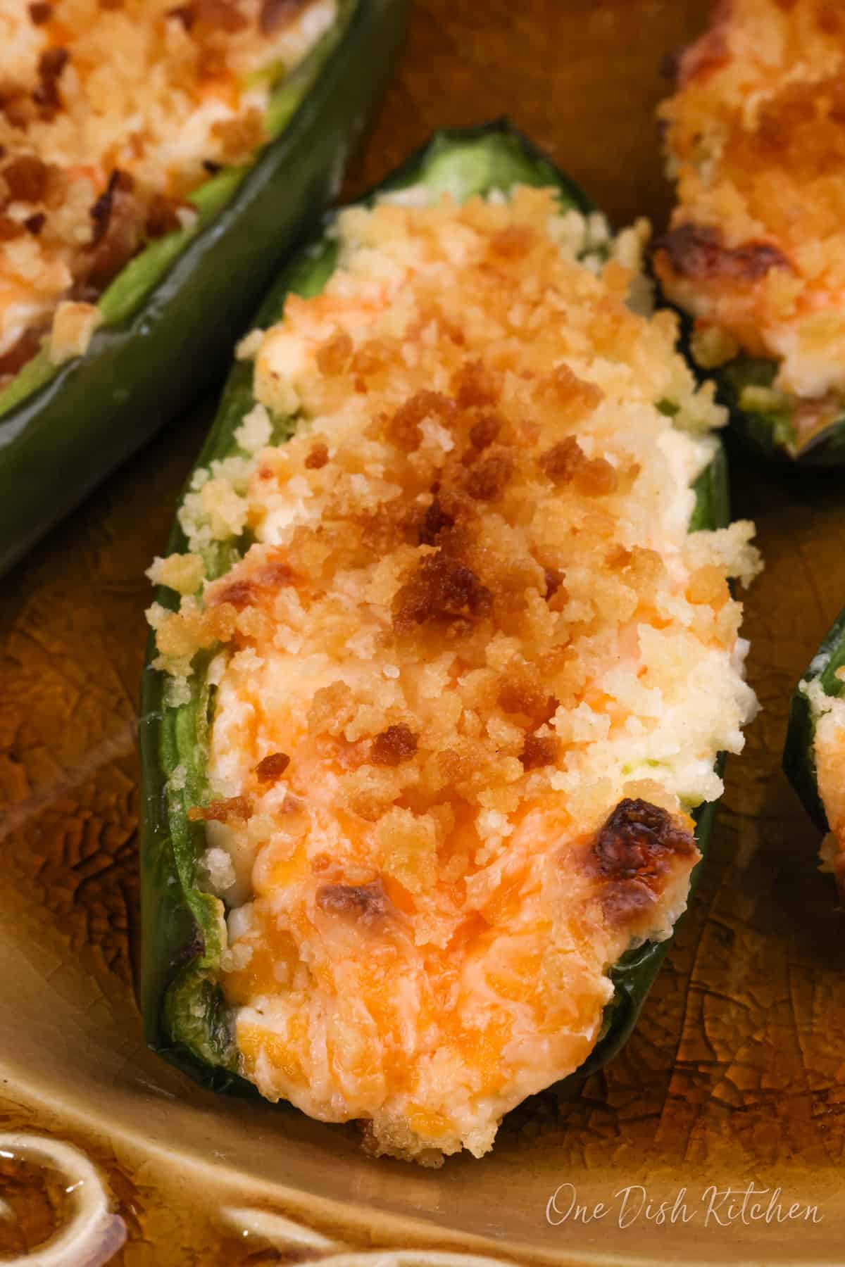 one jalapeno popper topped with bread crumbs